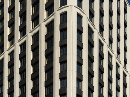 Windows of the residential building. Urban obsolete facade of house.の写真素材