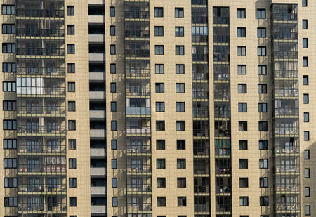 Windows of the residential building. Urban obsolete facade of house.の写真素材