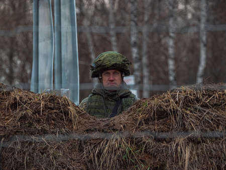 Kazan, Russia. 08 November 2021. A soldier on duty in a trench at a peacekeeping post. The line of demarcation. Russian Armed Forcesのeditorial素材