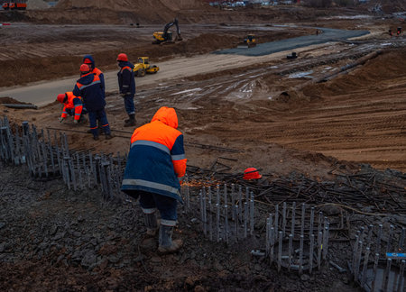 Kazan, Russia. 10 November 2021. Welding rebar for road tunnel construction. A welder is welding metal parts.のeditorial素材