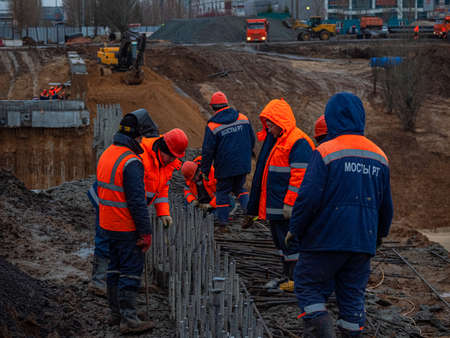 Kazan, Russia. 10 November 2021. Welding rebar for road tunnel construction. A welder is welding metal parts.のeditorial素材