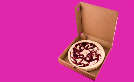 Fresh cheesecake in opened paper box, close up.の写真素材