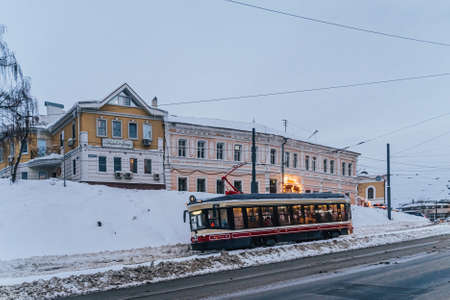 Nizhny Novgorod, Russia. January 03, 2022. A retro-style tram in the city centre. A vintage tourist streetcarのeditorial素材
