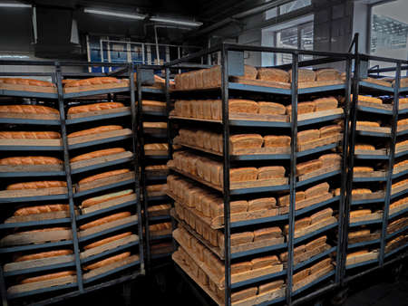 Shelves with fresh bread. Finished bread products to be shipped to stores