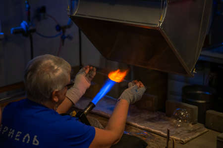 Nizhny Novgorod, Russia. January 03, 2022. Handmade Christmas tree glass toys. Glassblowing...