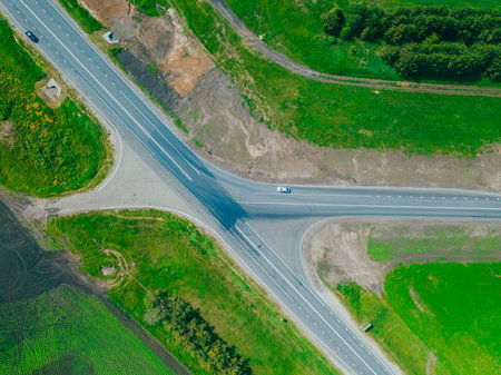 The road through the fields. View from a height. Agricultural fields.の写真素材