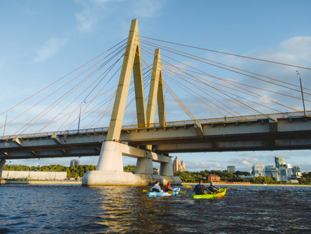 Kazan, Russia. 2022, June 22. Kayaking at summer time. Kayak trip.Water entertainment in Kazan. Millennium Bridgeのeditorial素材