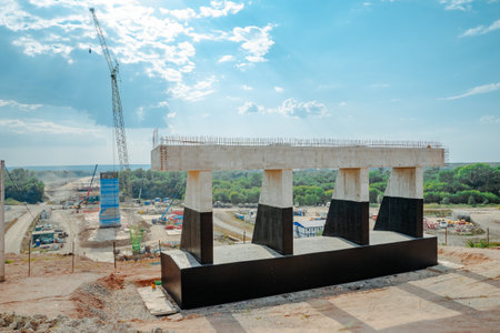 Constructing concrete pillars of the bridge. Construction of the new M12 highwayの写真素材