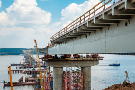 Constructing concrete pillars of the bridge. Construction of the new M12 highwayの写真素材