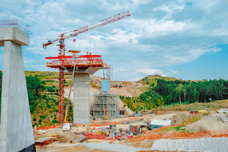 Constructing concrete pillars of the bridge. Construction of the new M12 highwayの写真素材