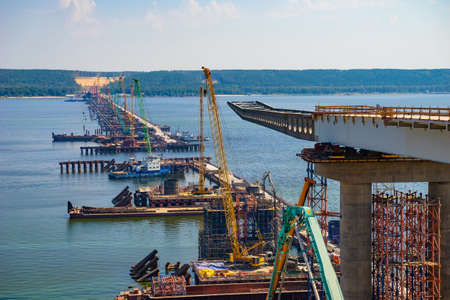 Construction of a bridge over the Volga River. Construction of bridge piers.の写真素材