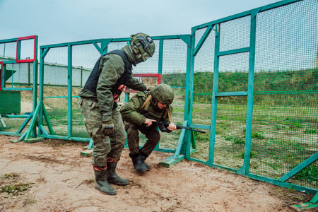 Mobilized Russian soldiers undergo combat training at the training ground.のeditorial素材