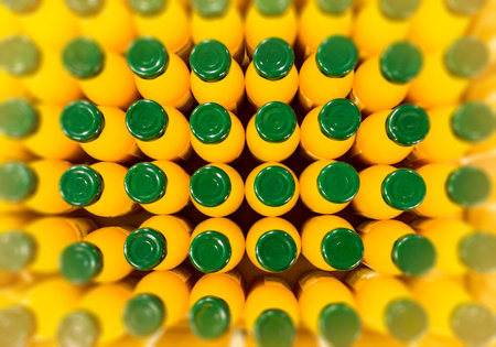 Fresh fruit juice in small glass bottles. Organic orange juice. A grocery store shelfの写真素材