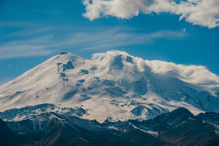 Big mountain Elbrus. Snow covered Greater Caucasus mountains. The two peaks of Mount Elbrus.の写真素材