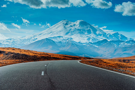 The road leading up to the mountain. Beautiful mountain scenery. Road close-up.の写真素材