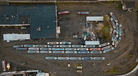 Trams parked in depot, public transport infrastructure. Aerial drone viewのeditorial素材