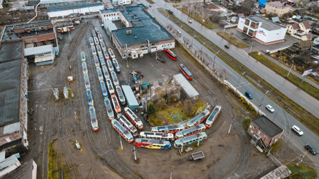 Trams parked in depot, public transport infrastructure. Aerial drone viewのeditorial素材