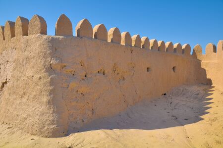 Medieval walls of clay with teeth.