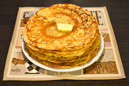 Russian national delicacy - pancakes with butter.の写真素材