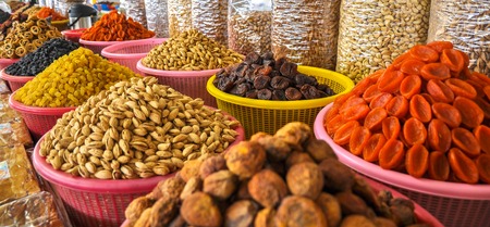 Dried fruits and nuts in the Uzbek market.の写真素材
