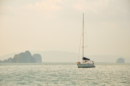 Sailing yacht in the sea among the islands.の写真素材