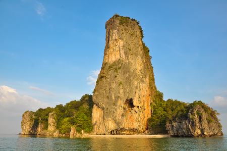 Tropical rocky island of a bizarre shape.の写真素材