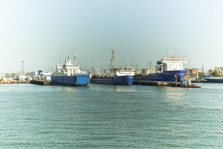Freight and passenger ferries at the pier.の写真素材