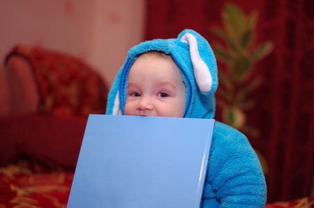 Baby with bookの写真素材