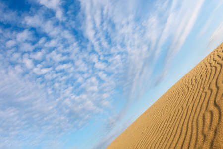 beautiful sky over dunesの写真素材