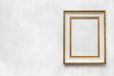 old frame on a white wallの写真素材