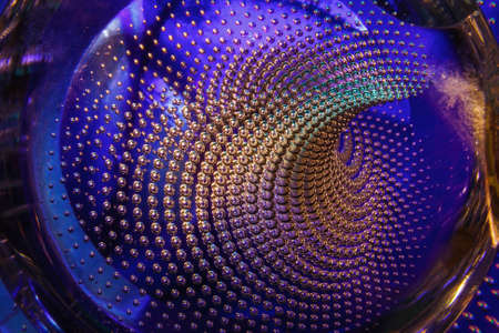 glitter air bubbles in the glass, blue background abstract texture