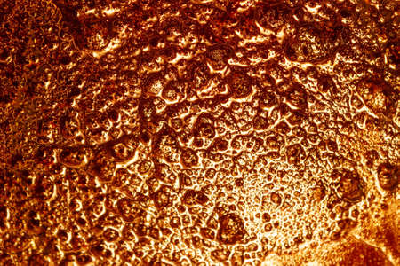 molten glass golden color, background textureの写真素材