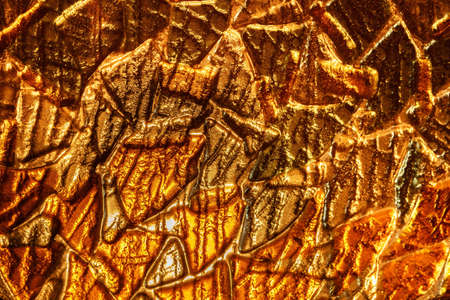 molten glass golden color, background textureの写真素材