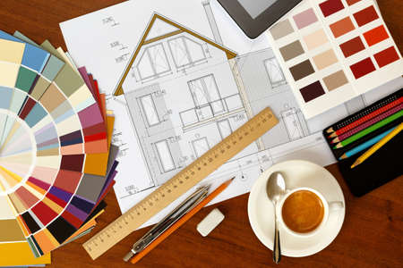 architectural facade drawing, Two color palette guide, pencils and ruler.Graphic designer at work
