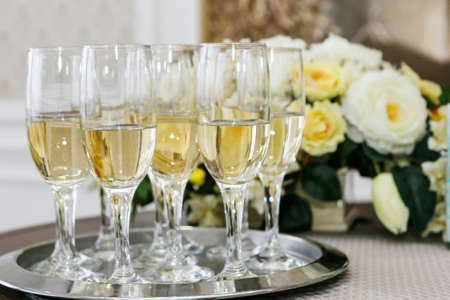 many of the champagne glasses on the table. Soft Focus, Selective Focus.の写真素材