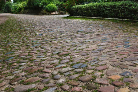 old pavement of rough cobblestone. Selective focusの写真素材