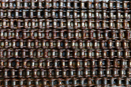 Pattern of dirty, Old, rusty bicycle chain. Abstract Background. top view
