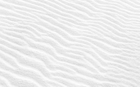 Wavy texture of white sand. Abstract background imageの写真素材