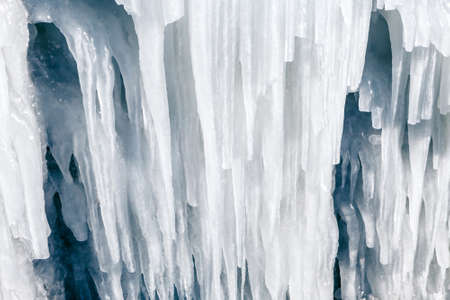 Big, long, white icicles. Winter Ice Storm