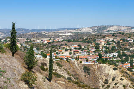 Typical Cypriot landscape, small houses with tiled roofs and mountains. Pissouri is a small coastal village located in the South-Western part of Cyprusの写真素材