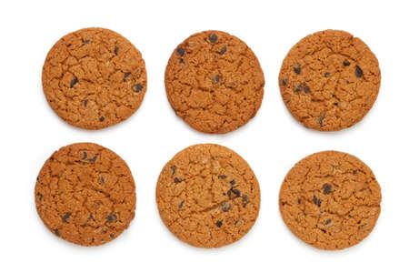 Six Oatmeal cookies with chocolate chips isolated on white background. Flat lay, top view