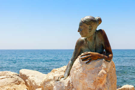 PAPHOS, CYPRUS - July 24, 2019: "Sol Alter", Bronze statue of the young goddess of love Aphrodite. Sculptor Yiota Ioannidouのeditorial素材