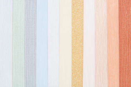 Samples for selecting the color of the interior walls. Book of Wallpaper samples for the designer's...
