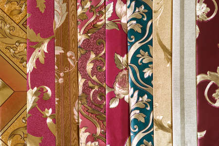 Samples for selecting the color of the interior walls. Book of Wallpaper samples for the designer's...