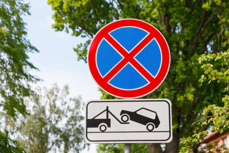 Road signs Parking is prohibited and car evacuation.の写真素材