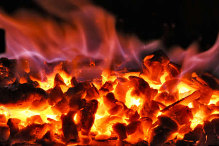 Charcoal in the flames of fire