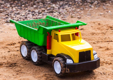 Toy truck with sand on it