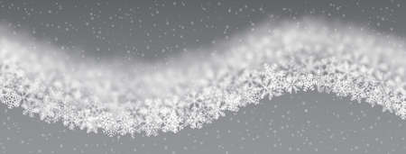 Christmas background of snowflakes of different shape, blur and transparency, wave shaped, on gray backgroundの写真素材