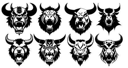 Set of horned bull heads with open mouth and bared fangs, with different angry expressions of the muzzle.のイラスト素材