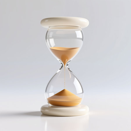 Realistic hourglass on white base, symbolizing time passage and mortality, with golden sand flowing through glass bulbs, against a minimalist white background.の素材